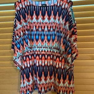 Multi colored top. 95% polyester and 5% spandex